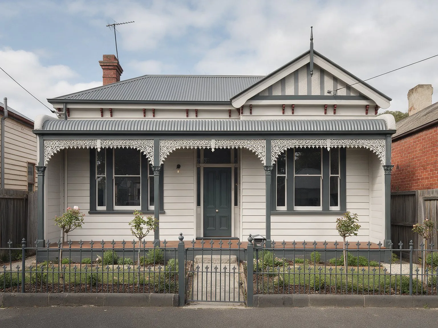 Representative image: a renovated Victorian-era weatherboard house with an iron-lace verandah in an inner-Melbourne street
