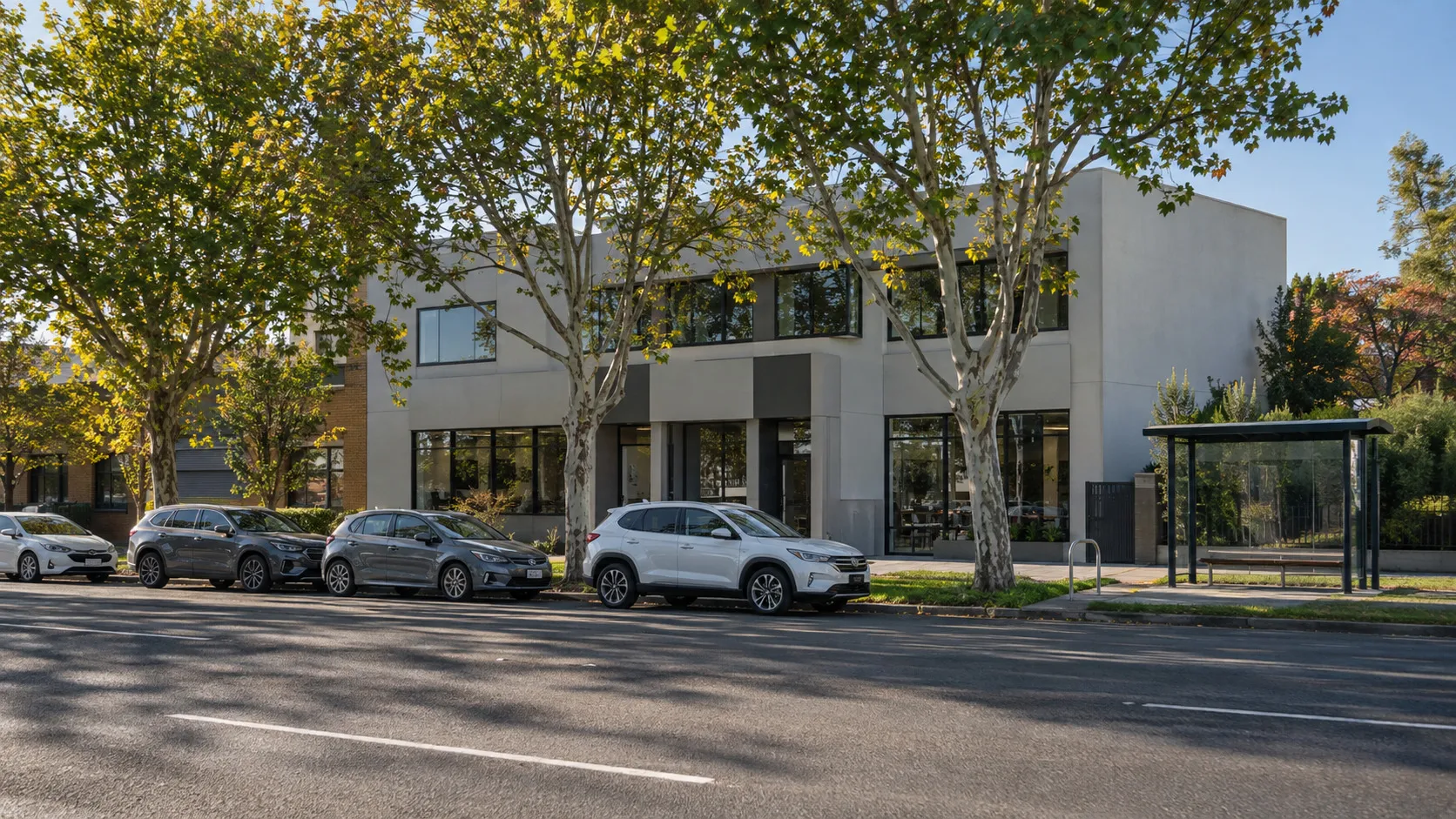 A low-rise commercial building on a Melbourne street in morning light